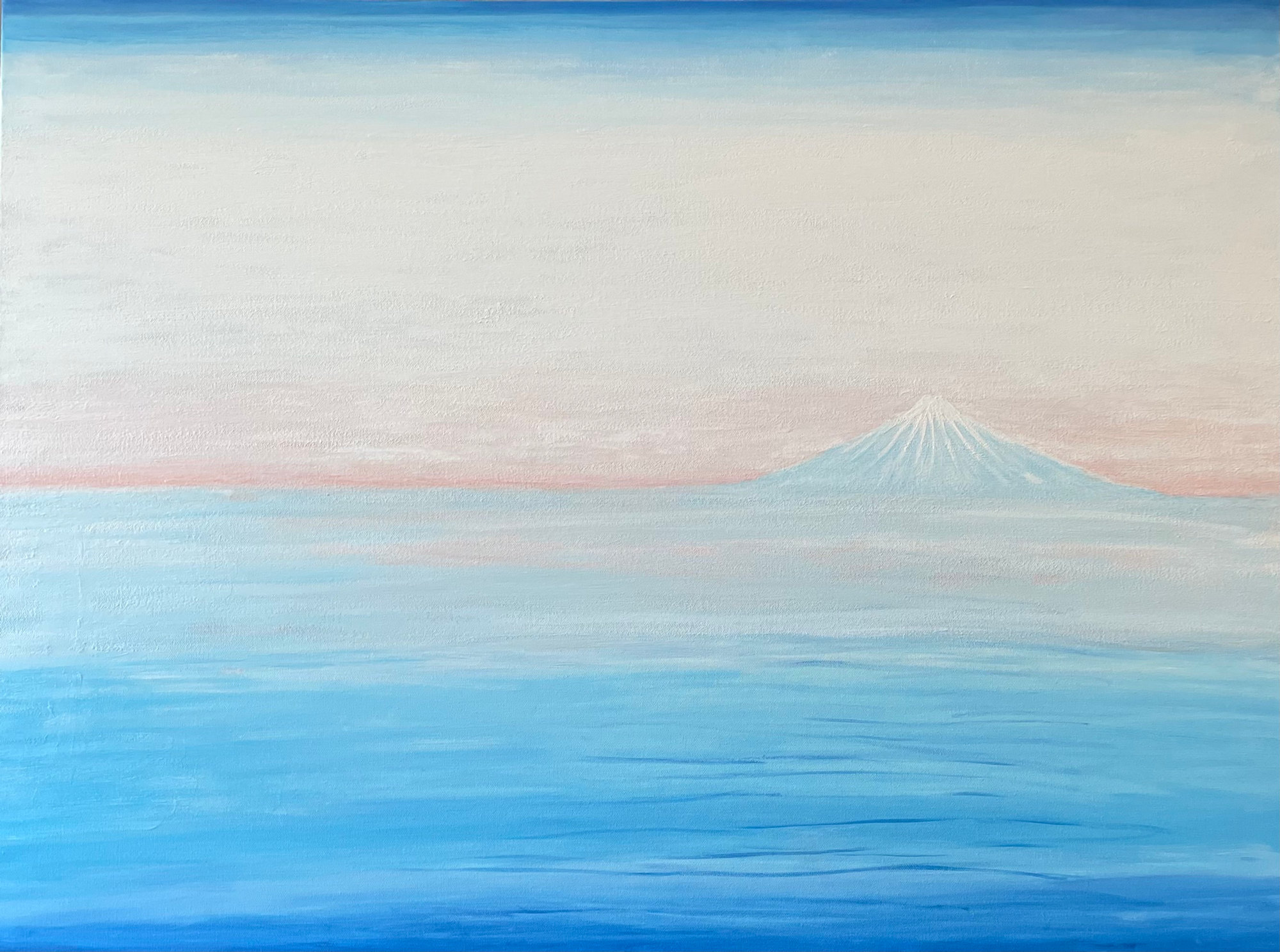 Mount Fuji rising from a pale blue sea under a soft peach and white sky