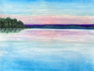 Pink dusk sky reflected in a still lake